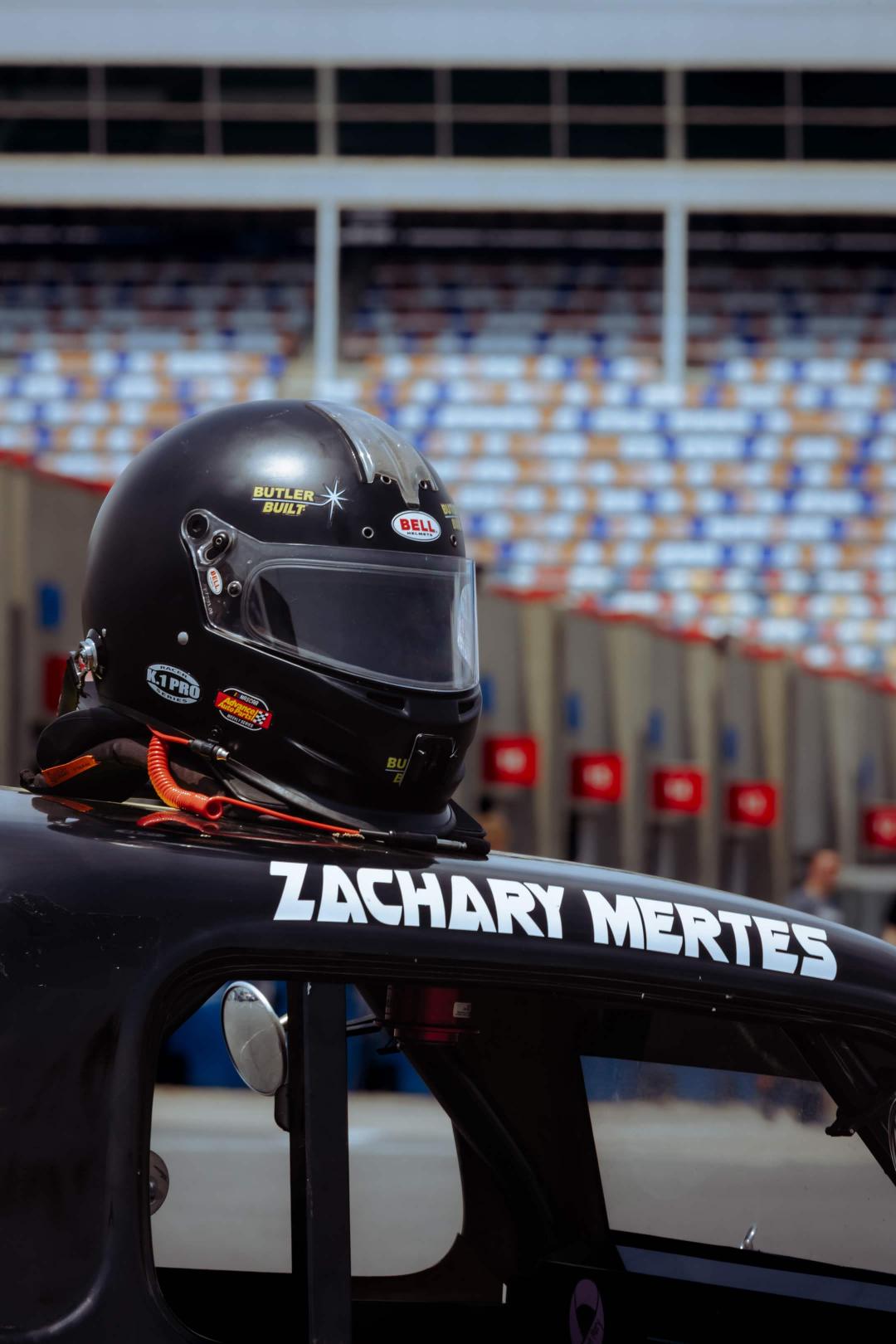 Helmet resting on the roof of the No. 02 race car
